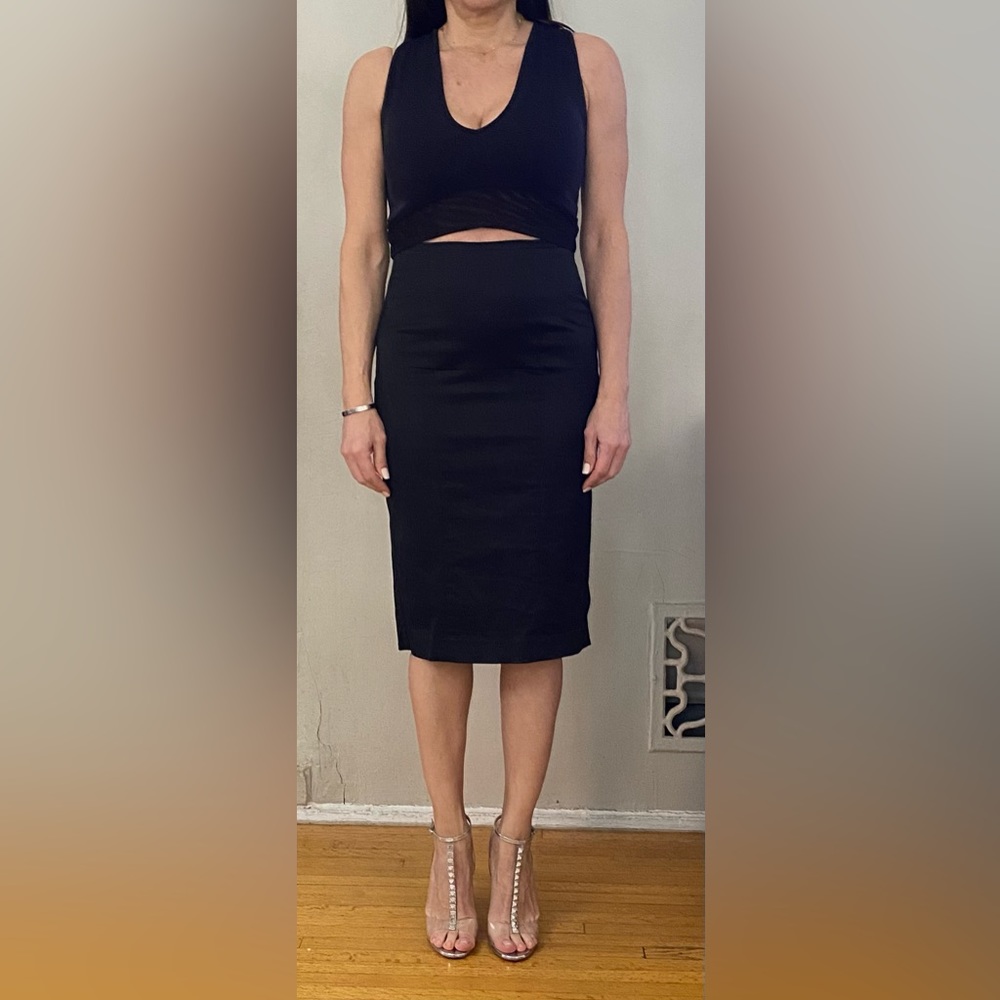 Bebe, black, satin-finish skirt. Size Small.